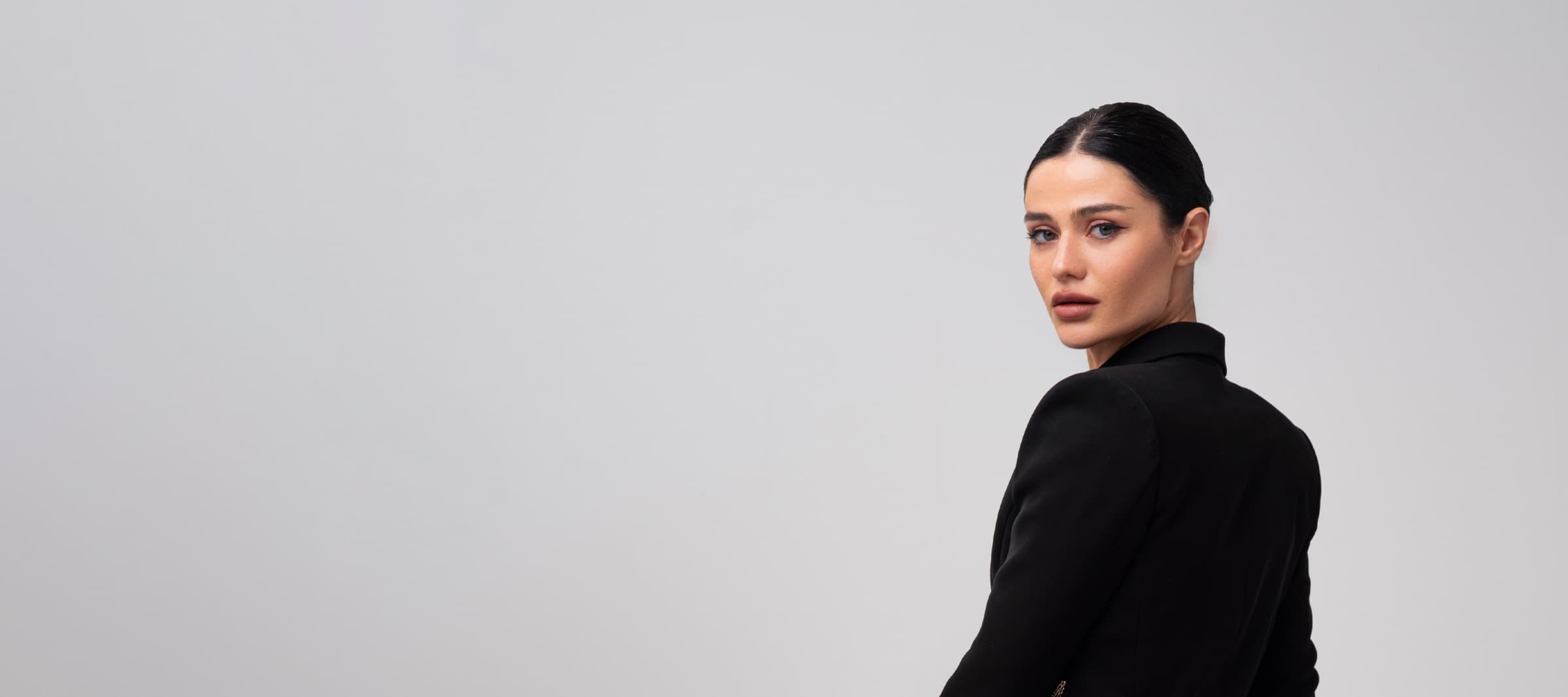 Model in a tailored black jacket